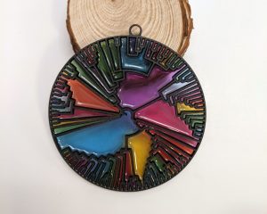 stained glass christmas ornament that shows a phylogenetic tree diagram